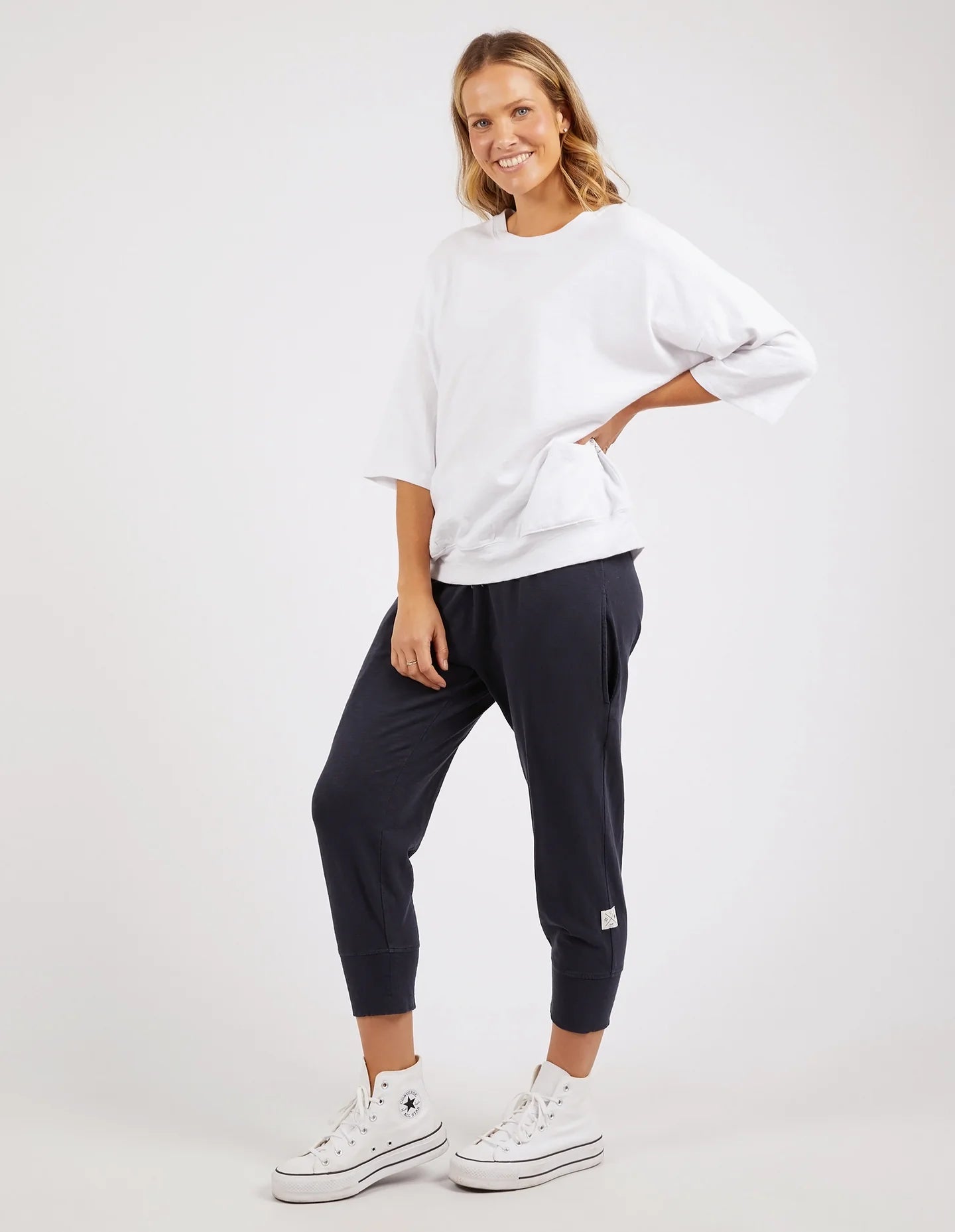 White Mazie Sweatshirt crafted from soft, cozy fabric, featuring a relaxed fit, ribbed cuffs, and a classic crew neckline for effortless comfort and style.