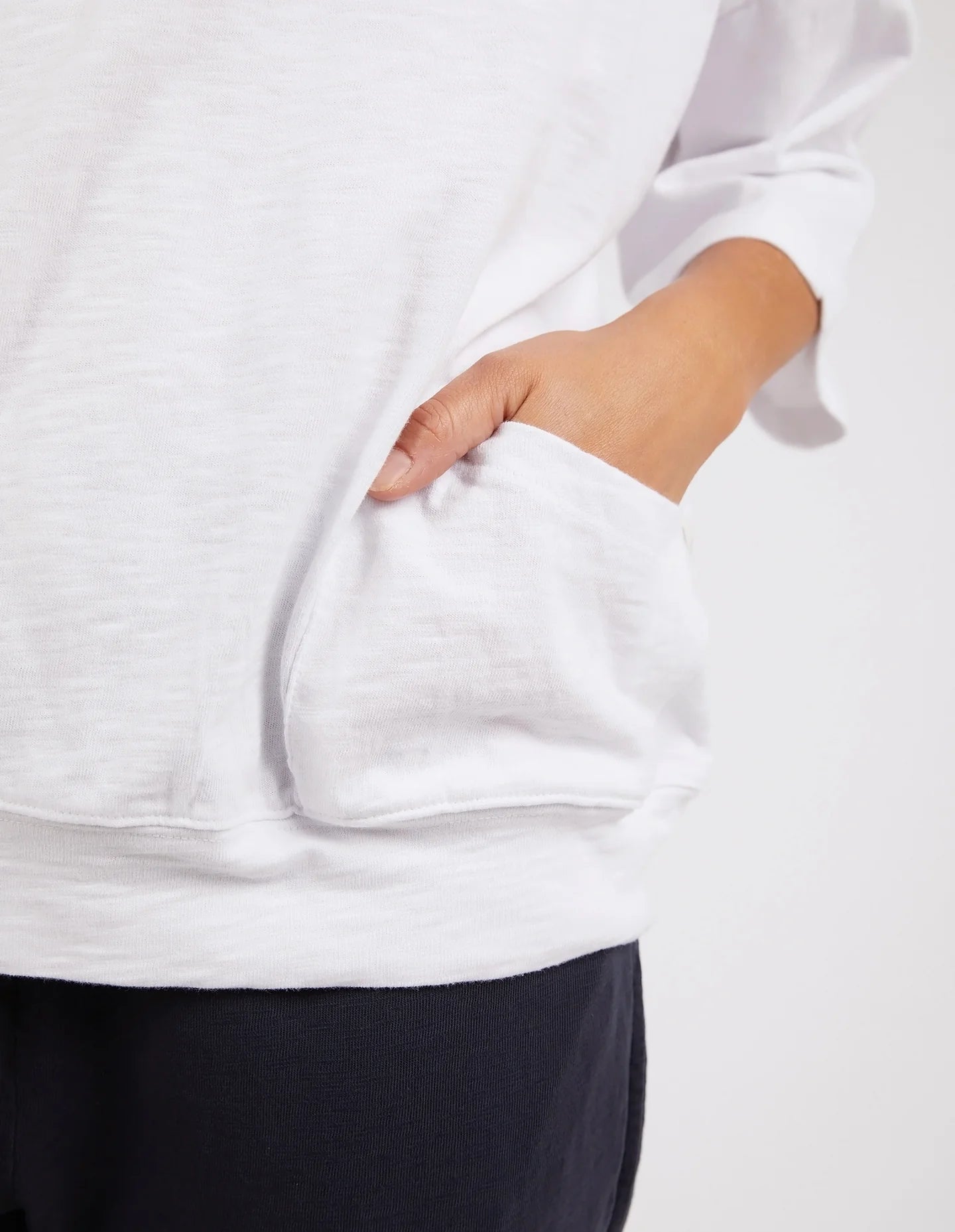 White Mazie Sweatshirt crafted from soft, cozy fabric, featuring a relaxed fit, ribbed cuffs, and a classic crew neckline for effortless comfort and style.