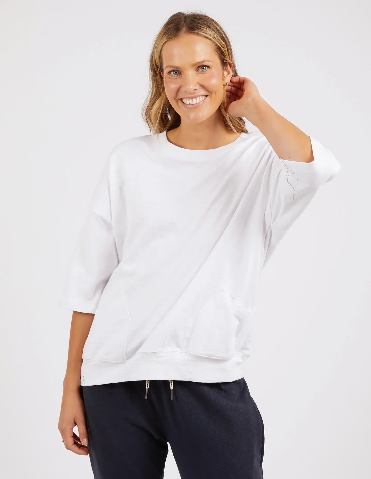 White Mazie Sweatshirt crafted from soft, cozy fabric, featuring a relaxed fit, ribbed cuffs, and a classic crew neckline for effortless comfort and style.