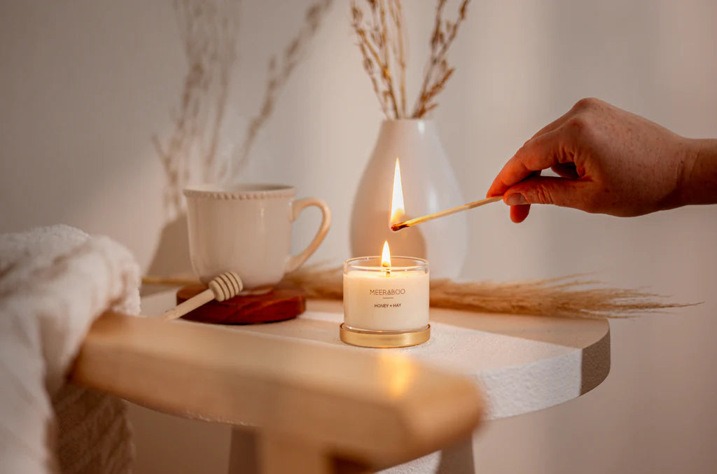 Meeraboo Mini Gold Lid Soy Candle with a brushed gold lid in a reusable glass vessel, hand-poured with soy wax for beautifully scented small spaces.