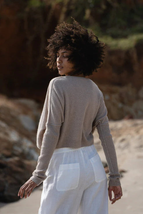 Miri Cashmere Sweater in oatmeal, lightweight and soft, with a cozy, minimalist look.