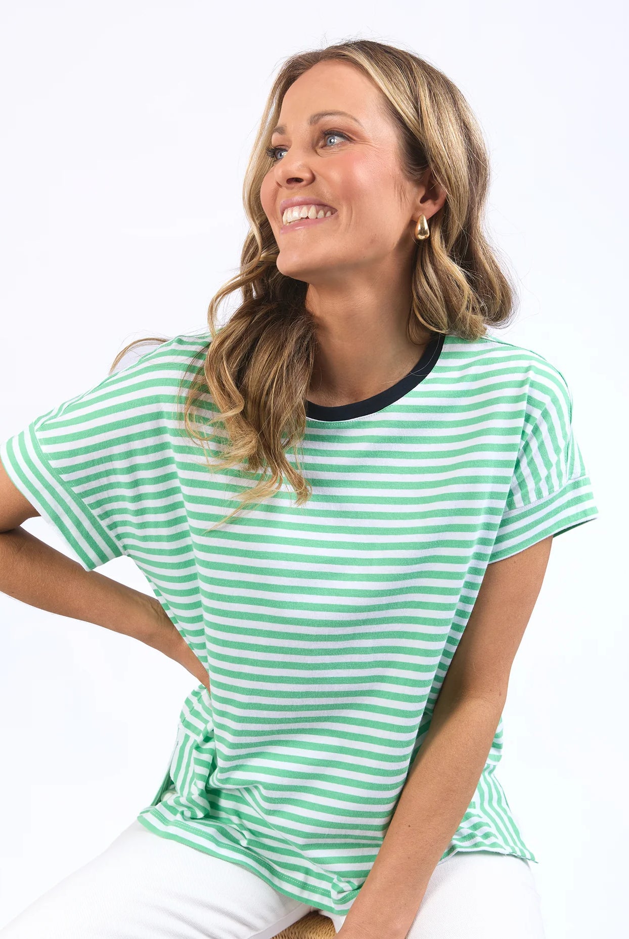 Neon mint, white, and navy striped Jarrah Tee by Elm with a relaxed fit, cuffed sleeves, and side splits, crafted from soft cotton jersey.