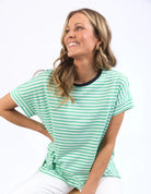 Neon mint, white, and navy striped Jarrah Tee by Elm with a relaxed fit, cuffed sleeves, and side splits, crafted from soft cotton jersey.