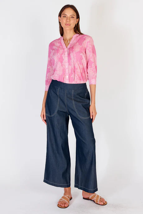 Wide-leg denim palazzo pants with a flat front waistband, elasticated back, and side pockets, offering a relaxed and stylish fit.