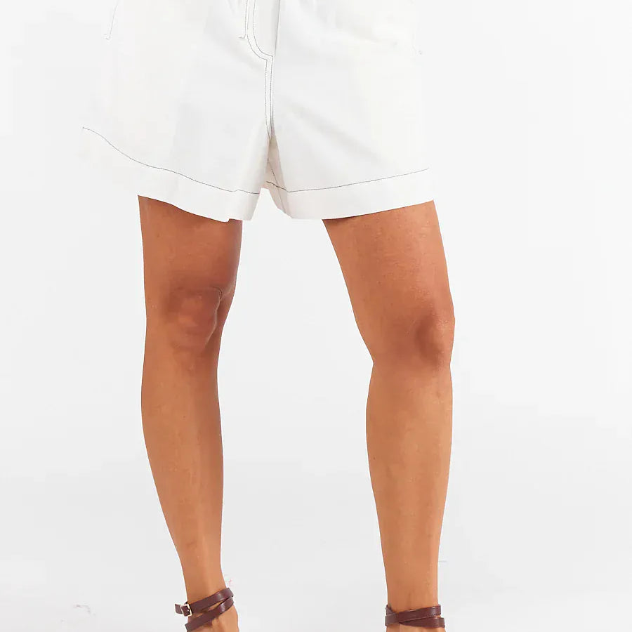 Pula Shorts in white and denim, featuring an elasticated waistband and side pockets.