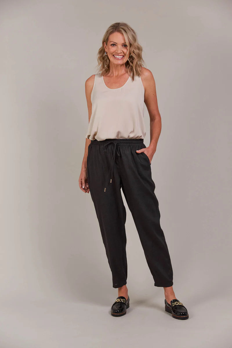 Relaxed-fit pant with an elastic waist, adjustable drawstring, and tapered ankle-length cut, made from a breathable linen-cotton blend for effortless style.