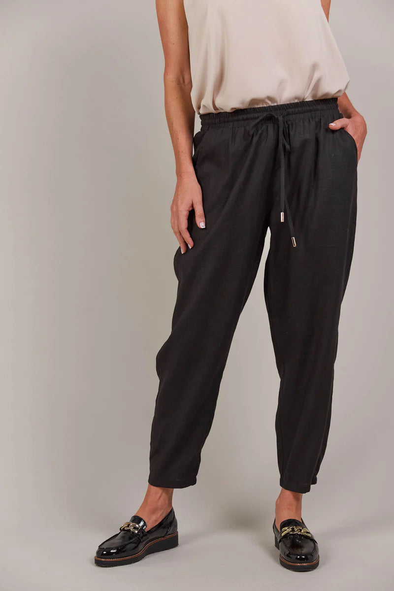 Relaxed-fit pant with an elastic waist, adjustable drawstring, and tapered ankle-length cut, made from a breathable linen-cotton blend for effortless style.