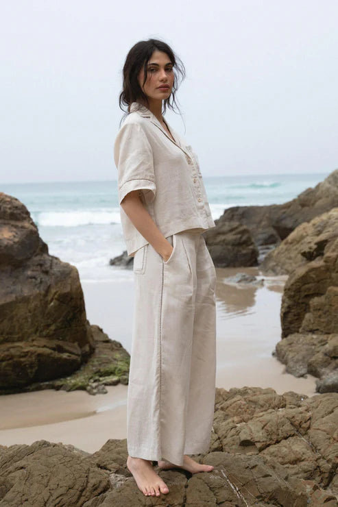 Rika Linen Pants in Chalk: Light, breathable linen fabric with a relaxed fit, perfect for warm weather styling.