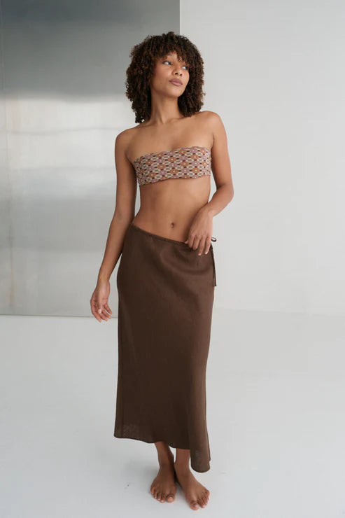 Riley Bias Linen Skirt in Chocolate, midi-length with bias cut, lightly elasticated waist, functional drawstring, and refined French seams.