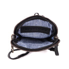 Rugged Hide Rosebery Phone Bag, a minimalist leather bag with a top zip closure, front sleeve pocket featuring a woven design, and an adjustable, removable long strap.