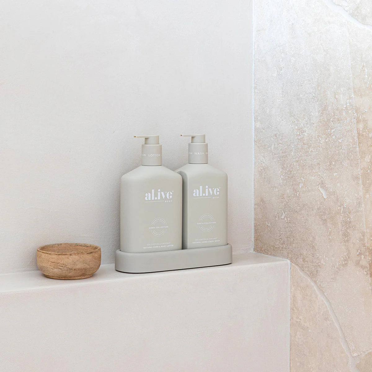 Alive Sea Cotton & Coconut Hand & Body Duo in Illuminated White featuring a 500ml hand and body wash and 500ml hand and body lotion in interlocking bottles with a matching tray.