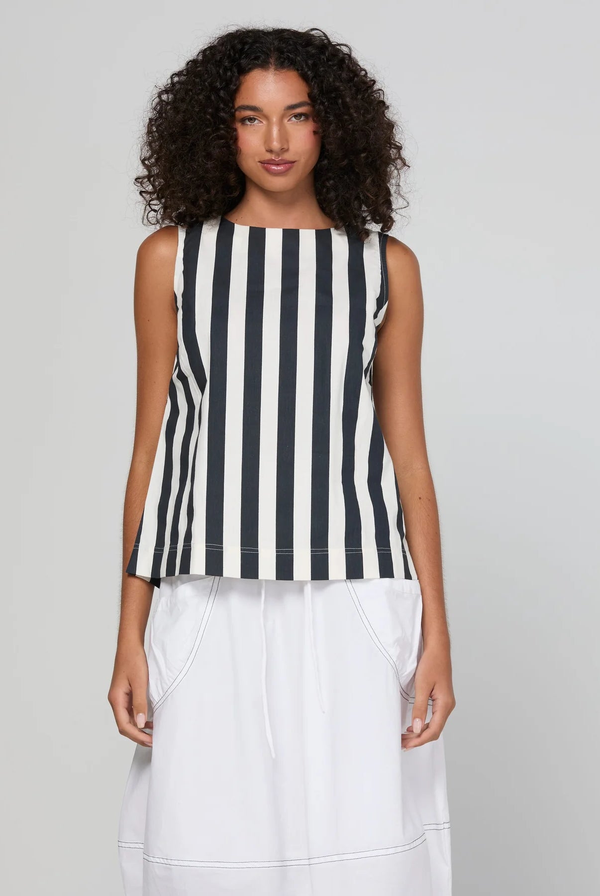 Shiro Top in Mono Stripe featuring a sleeveless design, relaxed A-line fit, round neckline and back keyhole detail.
