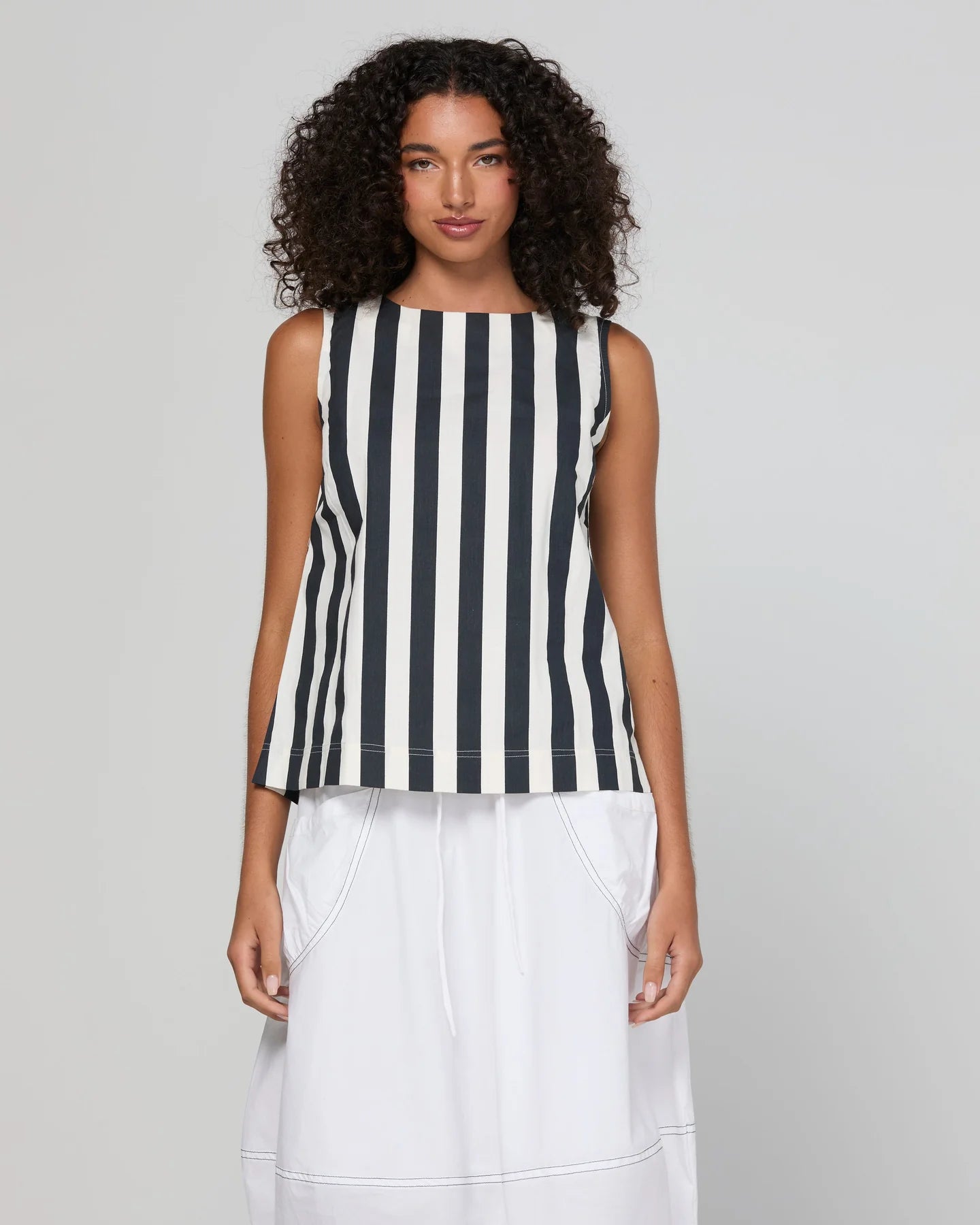 Shiro Top in Mono Stripe featuring a sleeveless design, relaxed A-line fit, round neckline and back keyhole detail.