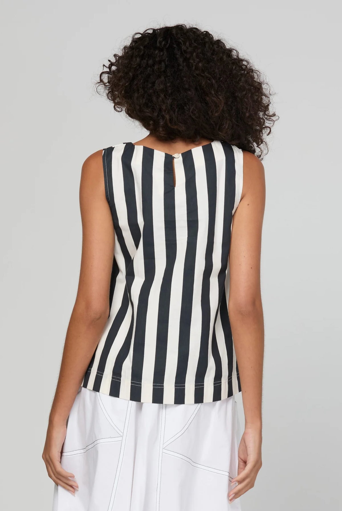 Shiro Top in Mono Stripe featuring a sleeveless design, relaxed A-line fit, round neckline and back keyhole detail.