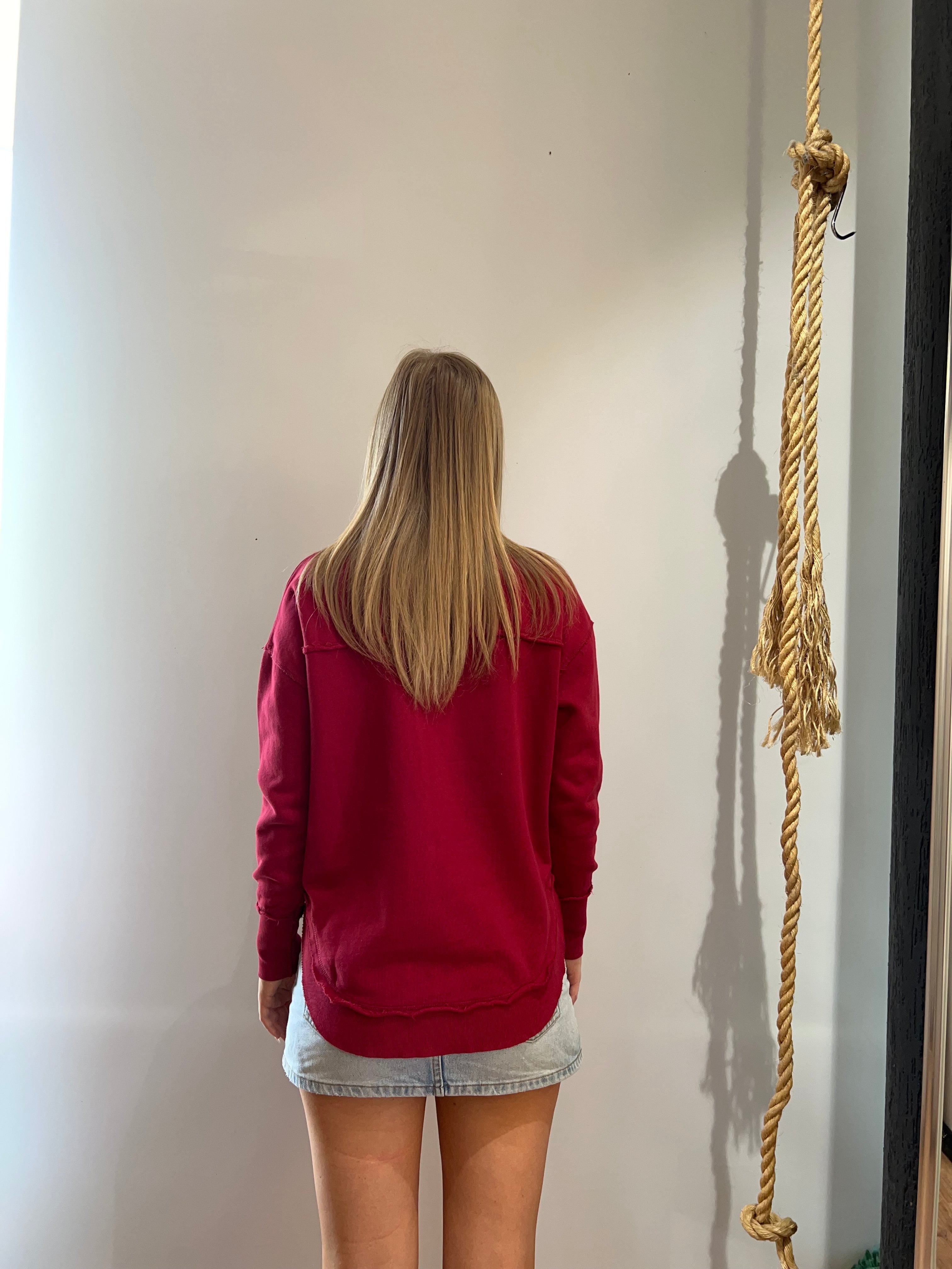 Foxwood Signature Crew in Rhubarb Red featuring front chest embroidery, raw edge detailing, a curved hem and soft 100% cotton fabric.