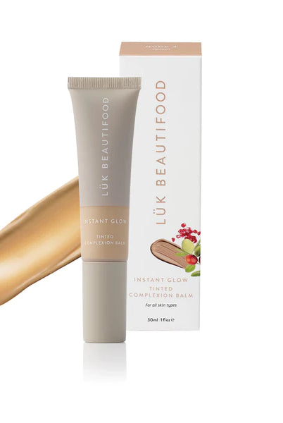 The Nude 4 - Medium Instant Glow Skin Tint by Luk Beautifood is currently available at Rawspice Boutique.