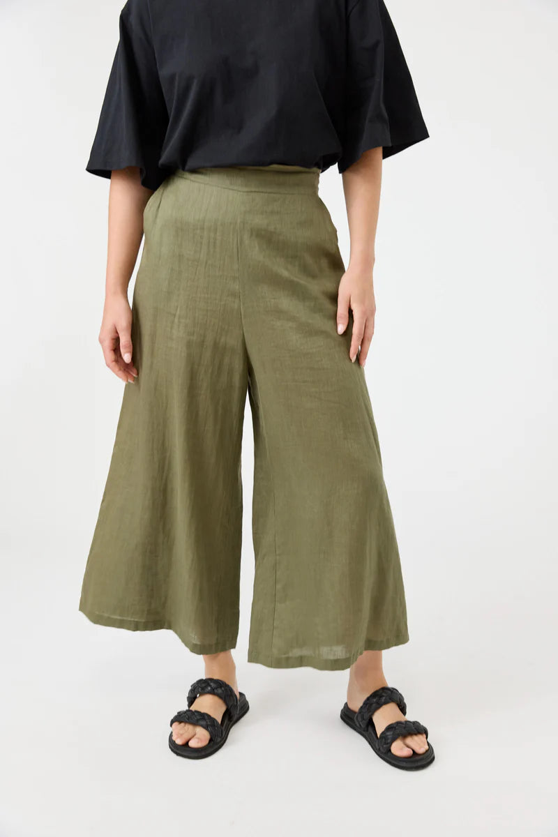 A pair of khaki wide-leg cropped linen pants with a relaxed fit, designed for a breathable and effortless summer look.