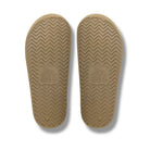 The Taupe Arch Support Slides by Archies are available at Rawspice Boutique.