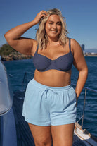 Light Blue Terry Towelling Shorts with an elastic waistband and adjustable drawstring, designed for comfort and relaxed summer style.