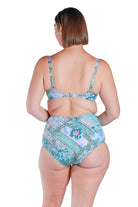 The Whitehaven Tankini Set by Capriosca is currently available at Rawspice Boutique.