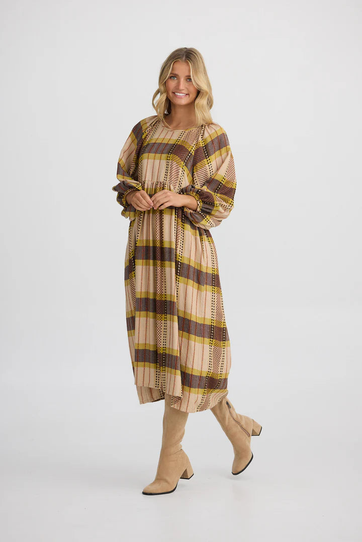 Angel Wings Dress in Santiago Check displayed with a soft round neckline, gathered waist, half-length sleeves, and a below-knee hem.