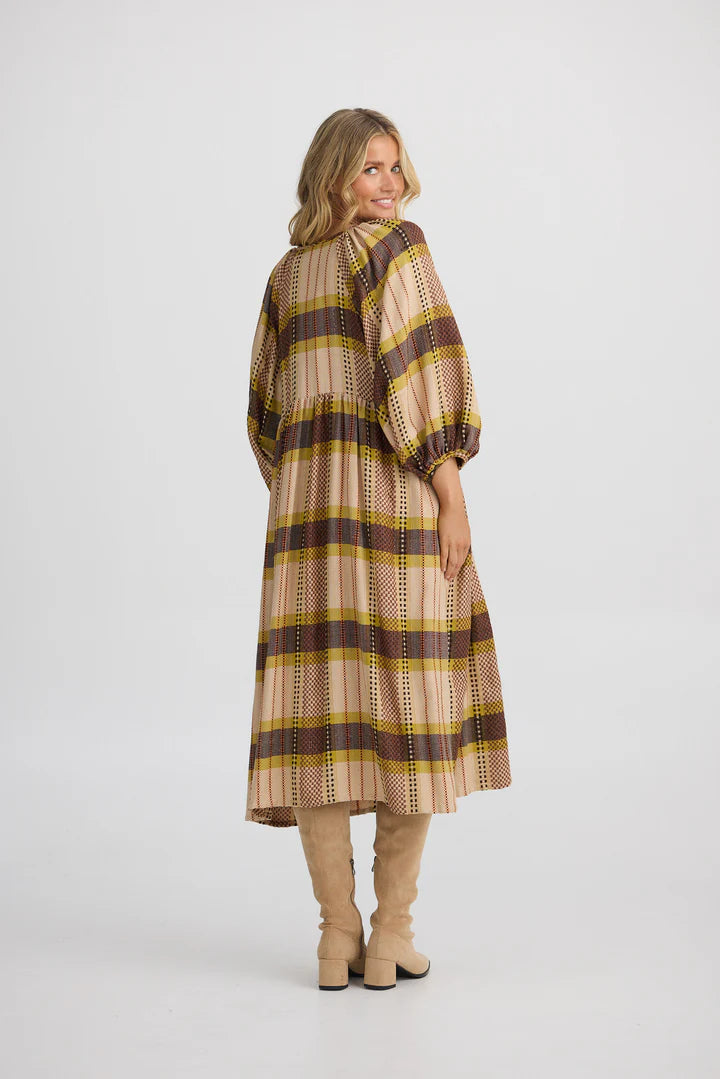 Angel Wings Dress in Santiago Check displayed with a soft round neckline, gathered waist, half-length sleeves, and a below-knee hem.