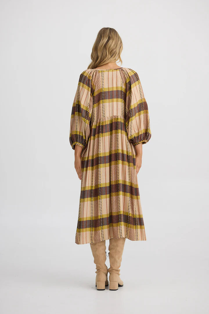 Angel Wings Dress in Santiago Check displayed with a soft round neckline, gathered waist, half-length sleeves, and a below-knee hem.