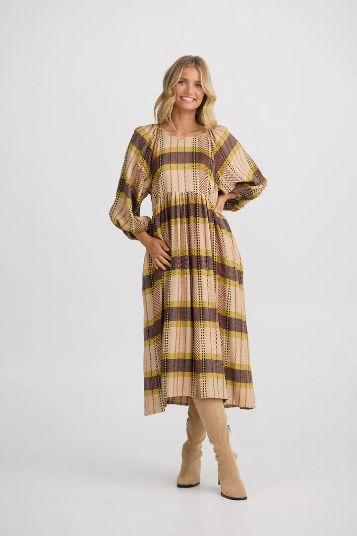 Angel Wings Dress in Santiago Check displayed with a soft round neckline, gathered waist, half-length sleeves, and a below-knee hem.