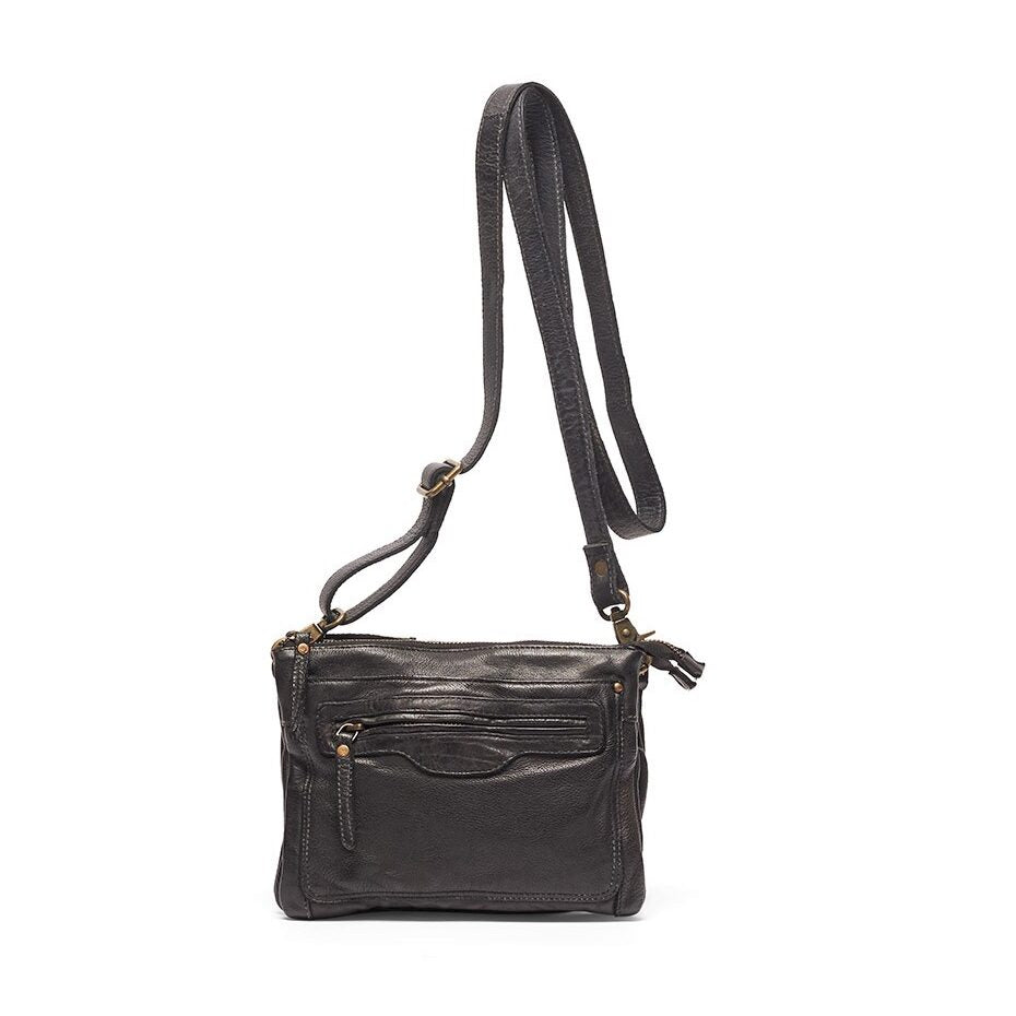 Rugged Hide Brielle Crossbody Bag, a soft leather bag with front zip pocket, two main zip compartments with internal zip and sleeve pockets, secured middle section, adjustable and removable strap, and brass metal fittings. Measures 22cm x 18cm x 3.5cm.