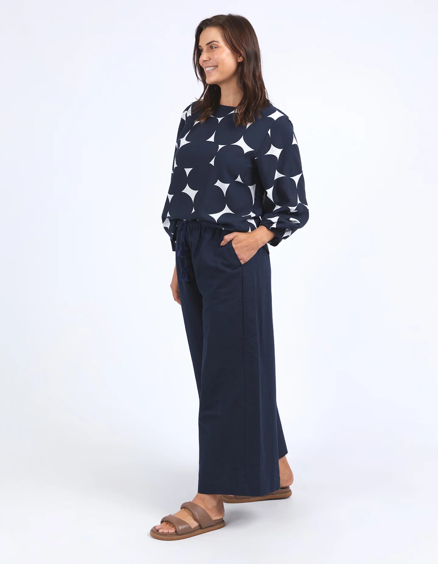 Light and flowy Demi Spot Top featuring an exclusive Elm spot print. Designed with an easy-fit shape and crafted from a breathable linen-lyocell blend for comfort and elegance.