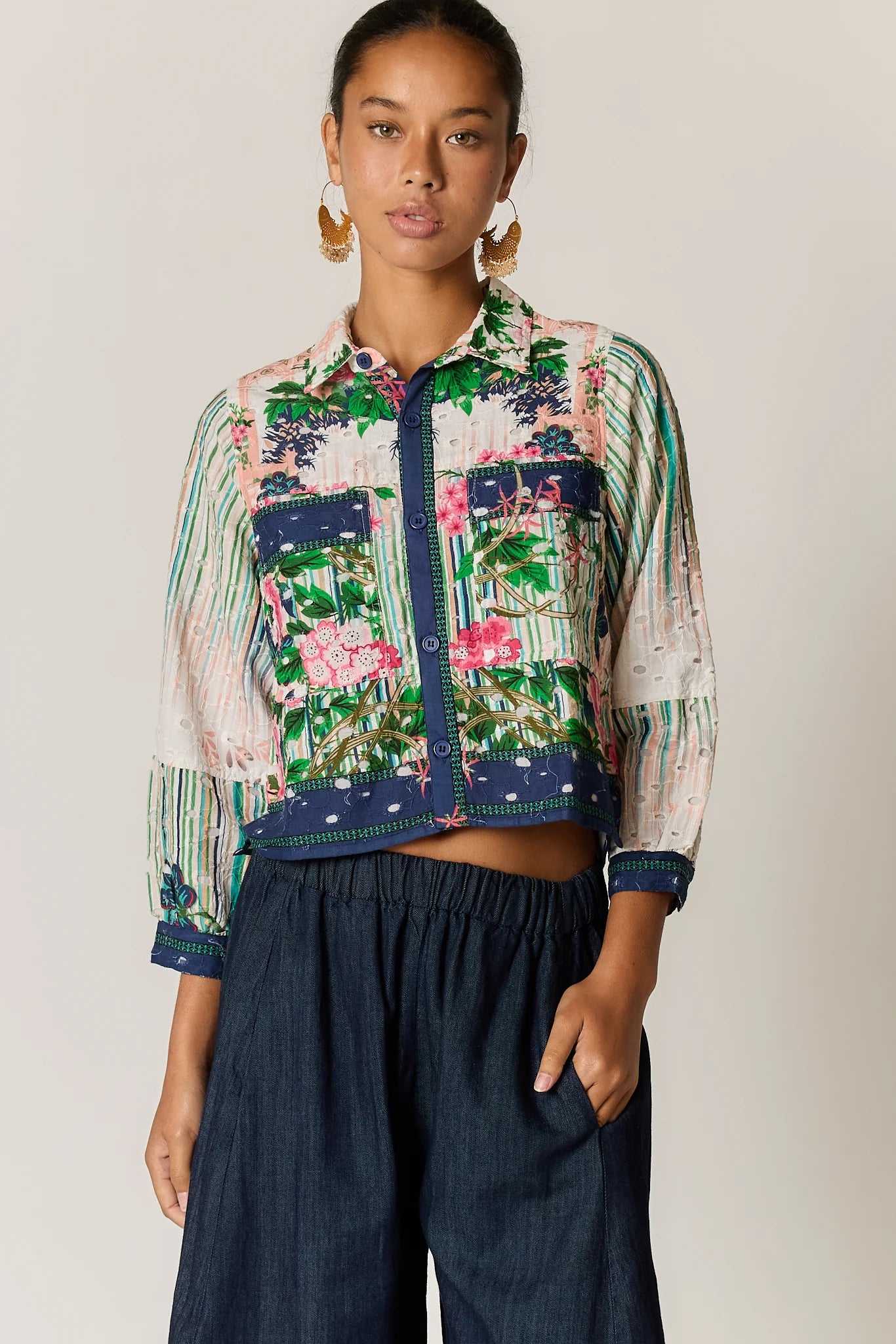 Roseanna bomber jacket in a multi-coloured patchwork-inspired floral print with a broderie basecloth.
