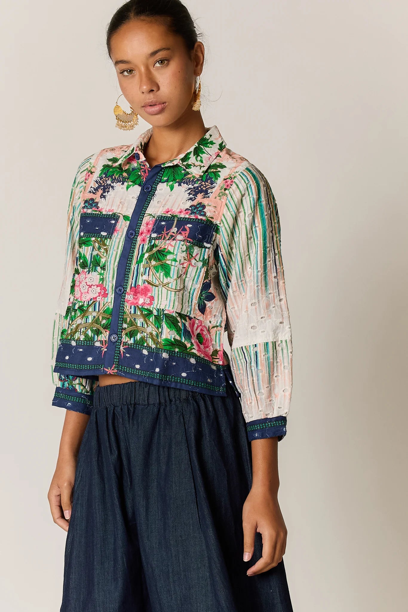 Roseanna bomber jacket in a multi-coloured patchwork-inspired floral print with a broderie basecloth.
