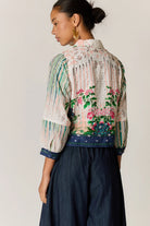 Roseanna bomber jacket in a multi-coloured patchwork-inspired floral print with a broderie basecloth.
