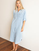 HUT 100% cotton denim shirtdress with tab sleeves, scoop hem and practical chest and side pockets