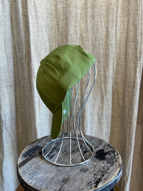 Smiley Cap in Olive with curved brim, adjustable back strap, and embroidered smiley face detail on the front.