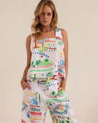 Sleeveless Marrakesh linen tank with square neckline and relaxed fit, perfect for breathable, stylish summer wear.