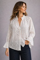 Lacewood Blouse in 100% cotton cutwork lace featuring a button-through front and relaxed, feminine silhouette.