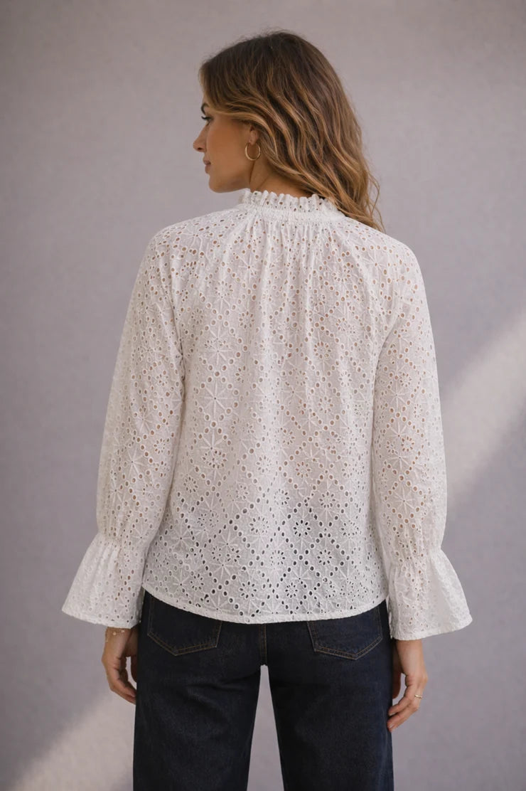 Lacewood Blouse in 100% cotton cutwork lace featuring a button-through front and relaxed, feminine silhouette.