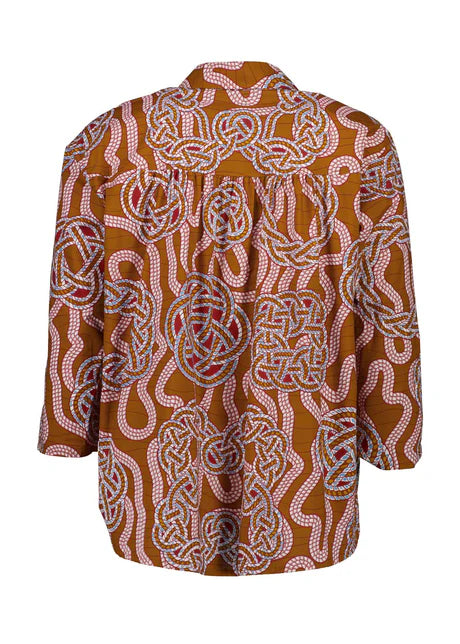 Loveknots Shirt Caramel by Olga De Polga is currently available from Rawspice Boutique, South West Rocks.