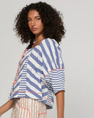 Boom Shankar Lucia Top in Ocean Stripe featuring chevron stripe panelling, balloon sleeves, contrast cuffs and an adjustable tie neckline.