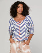 Boom Shankar Lucia Top in Ocean Stripe featuring chevron stripe panelling, balloon sleeves, contrast cuffs and an adjustable tie neckline.