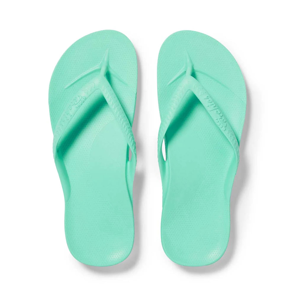 mint arch support thongs with contoured footbeds and ergonomic straps for enhanced comfort and stability.