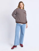 Model wearing the Original Stripe Crew, featuring yarn-dyed stripes, a relaxed fit, classic crew neckline, and a front chest pocket in a casual everyday style.