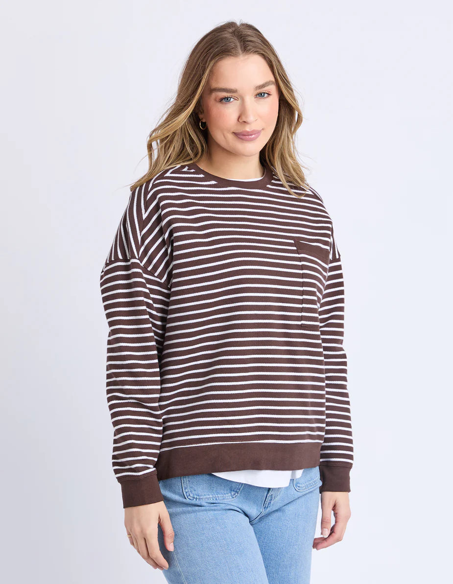 Model wearing the Original Stripe Crew, featuring yarn-dyed stripes, a relaxed fit, classic crew neckline, and a front chest pocket in a casual everyday style.