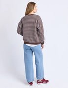 Model wearing the Original Stripe Crew, featuring yarn-dyed stripes, a relaxed fit, classic crew neckline, and a front chest pocket in a casual everyday style.