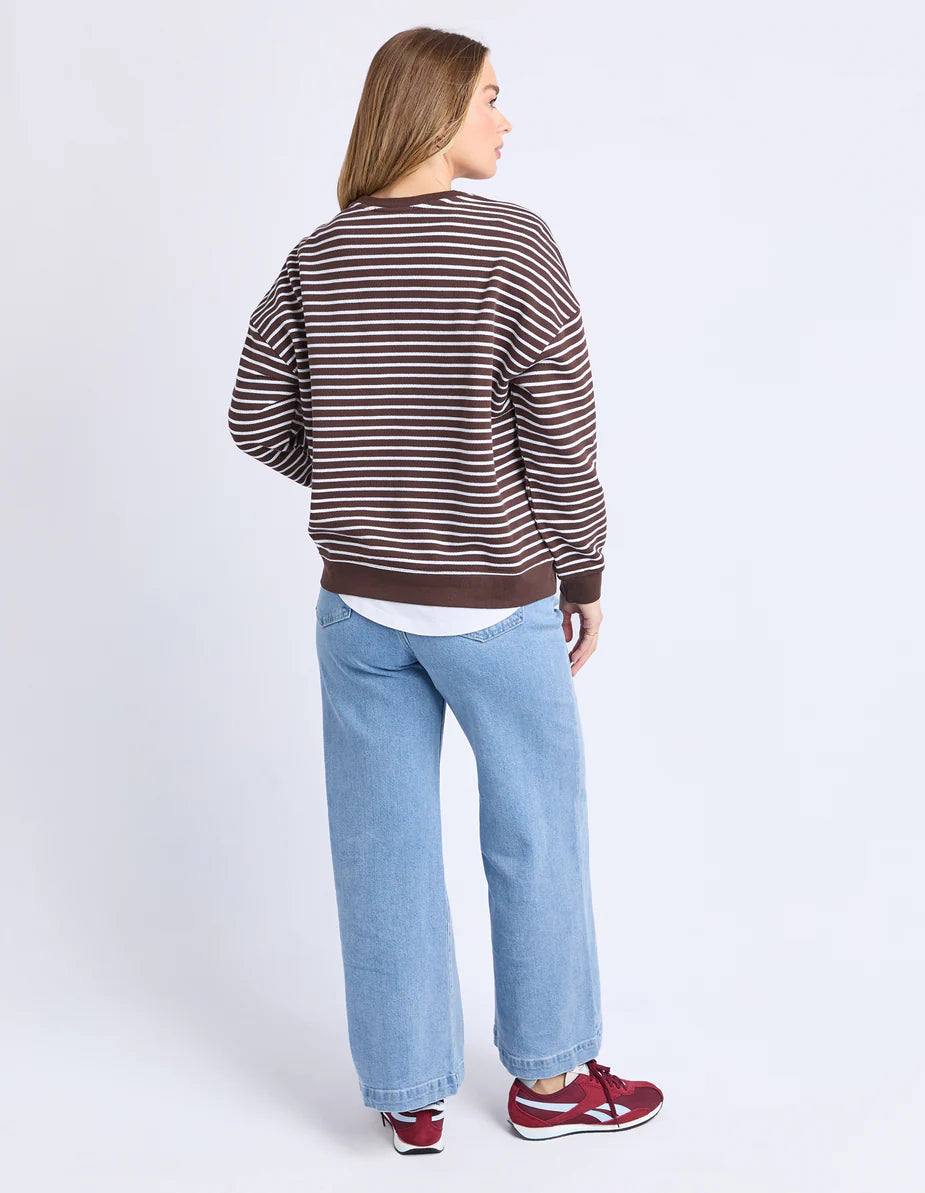 Model wearing the Original Stripe Crew, featuring yarn-dyed stripes, a relaxed fit, classic crew neckline, and a front chest pocket in a casual everyday style.