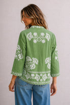Olivine Jacket in 100% premium linen featuring detailed floral embroidery and a relaxed, lightweight style.