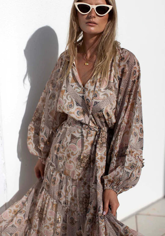 The Paradiso Maxi Dress by THREE OF SOMETHING is currently available at Rawspice Boutique.