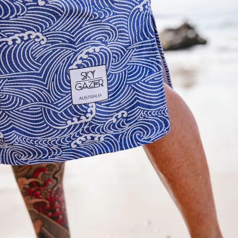 The Reef Surf Poncho is a sand-free, super-absorbent, quick-drying hooded towel. Lightweight, antibacterial and soft, with a pocket and optional waist tie.