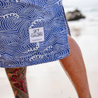 The Reef Surf Poncho is a sand-free, super-absorbent, quick-drying hooded towel. Lightweight, antibacterial and soft, with a pocket and optional waist tie.